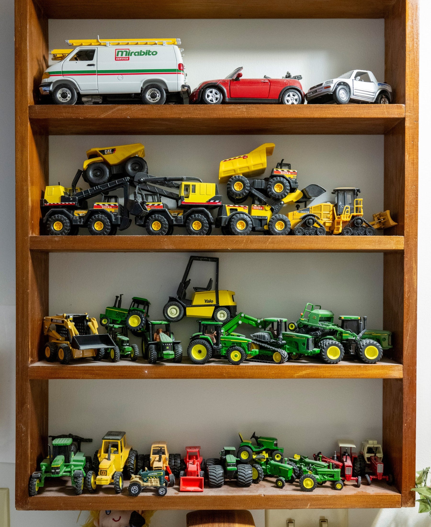 Zaid's tractor toy collection.